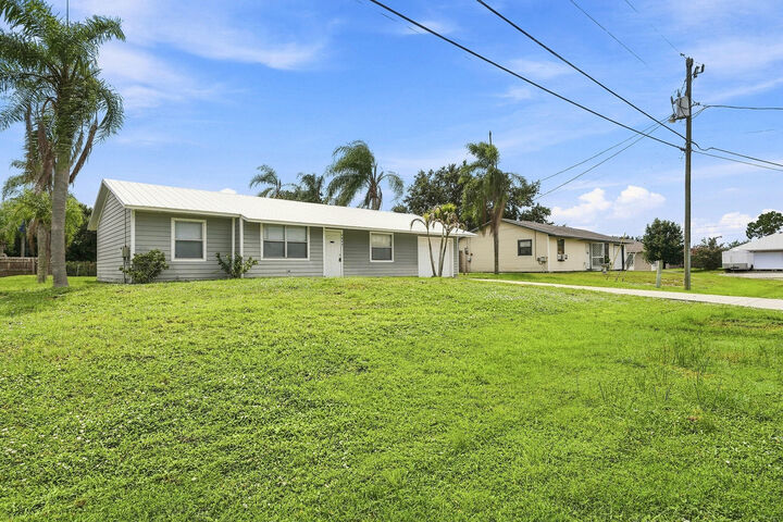Property Photo: 3873 SW Daisy Street FL 34953