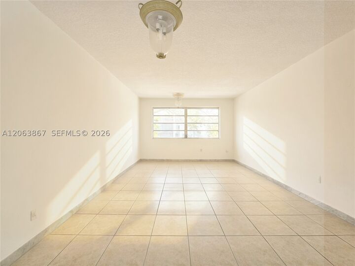 Property Photo: 1225 NE 124th St 24B FL 33161
