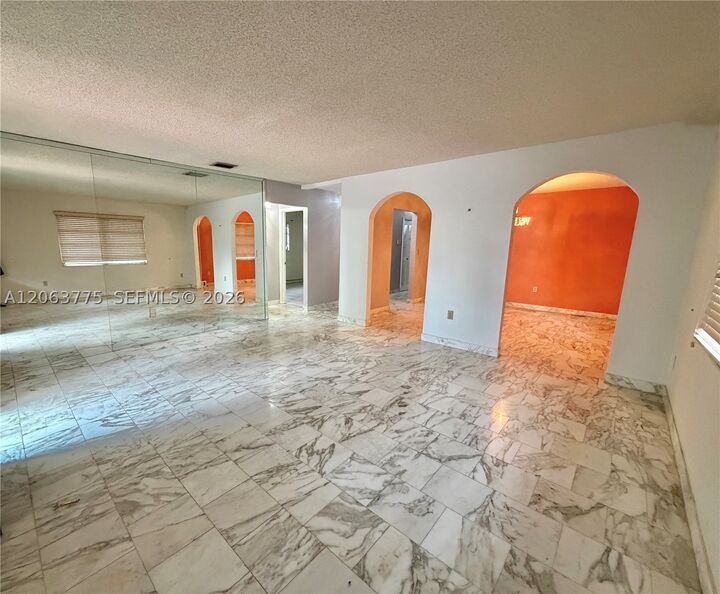 Property Photo: 320 NW 61st Ave FL 33126