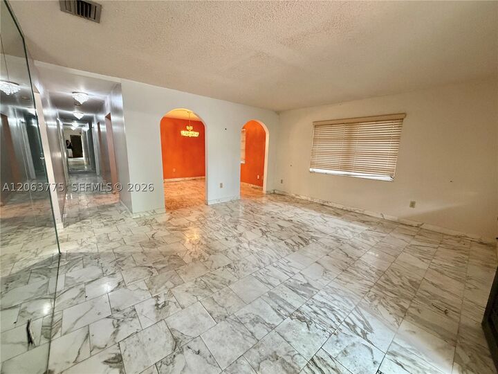 Property Photo:  320 NW 61st Ave  FL 33126 