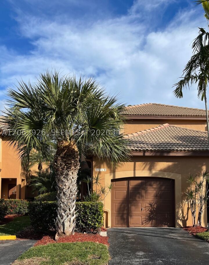 Property Photo:  1448 Barcelona Way 1-23  FL 33327 