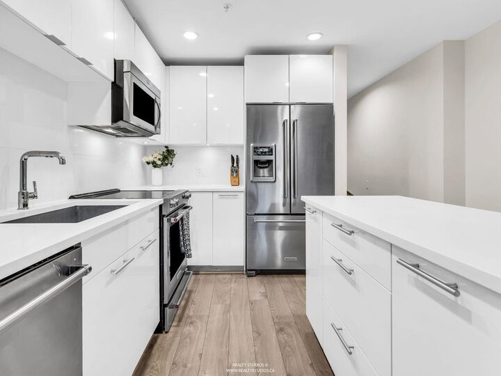Property Photo: 723 W 3rd Street 117 BC V7M 0E4