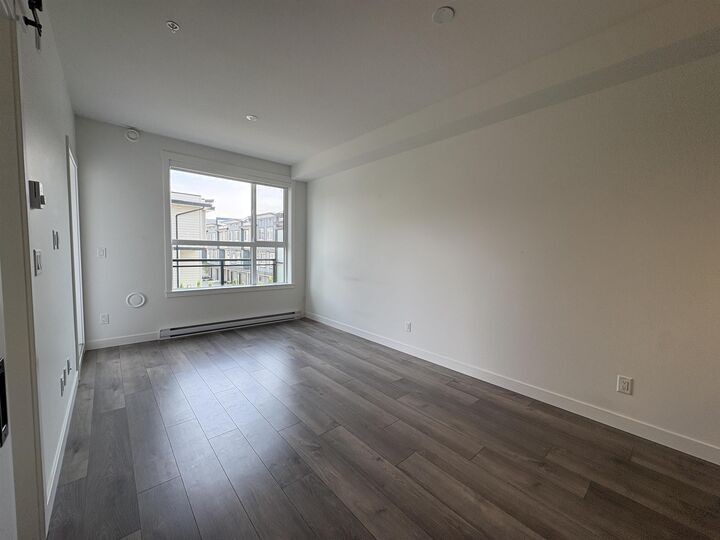 Property Photo:  5504 Brydon Crescent 203  BC V3A 0R3 