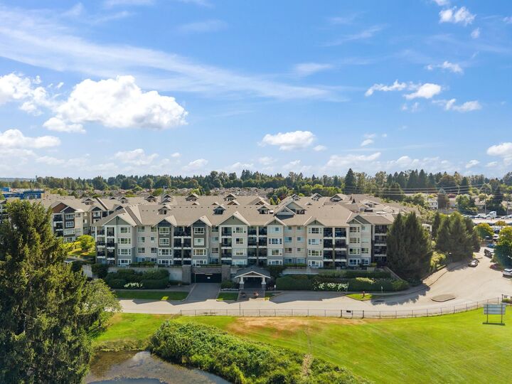 Property Photo:  19673 Meadow Gardens Way 104  BC V3Y 0A1 