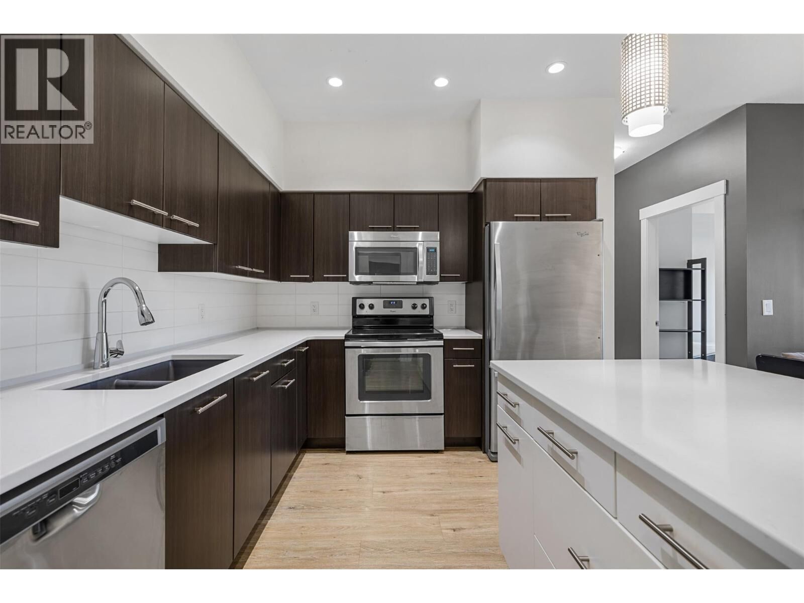 Property Photo: 985 Academy Way 104 BC V1V 3C8