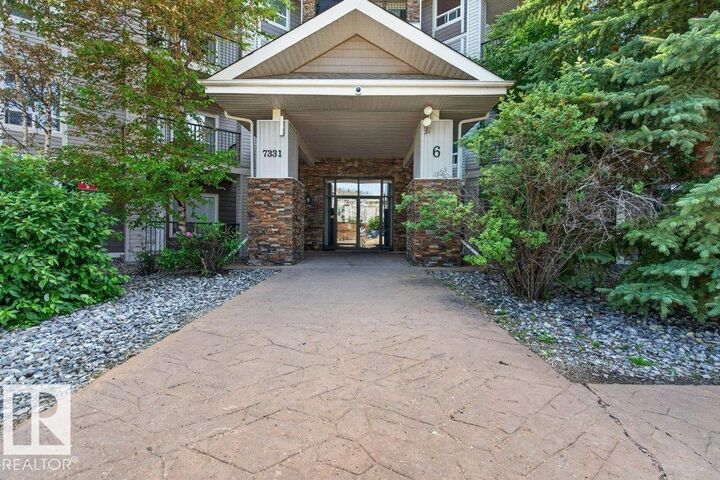 Property Photo: 7331 South Terwillegar Drive NW 6215 AB T6R 0L9