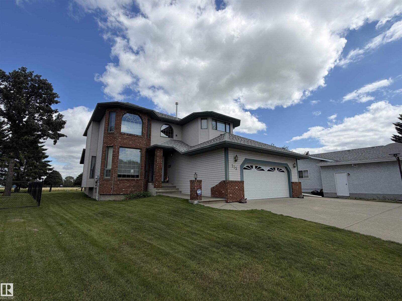 Property Photo:  115 Aspen Ridge Crescent  AB T9A 3N7 