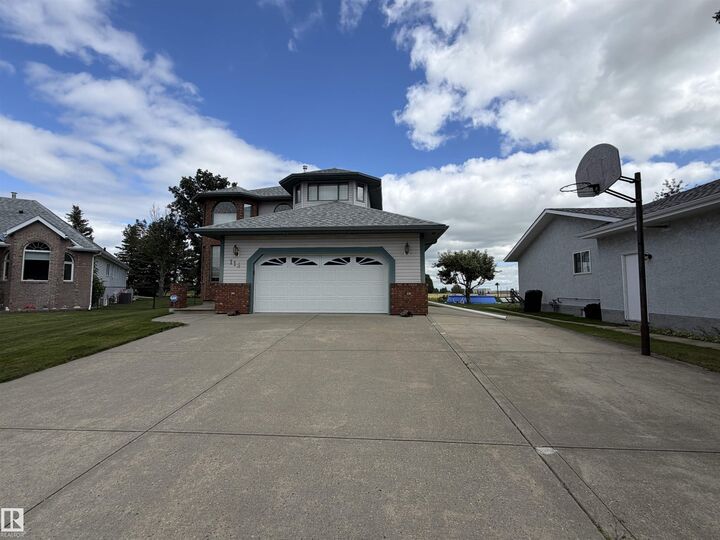 115 Aspen Ridge Crescent — photo 1