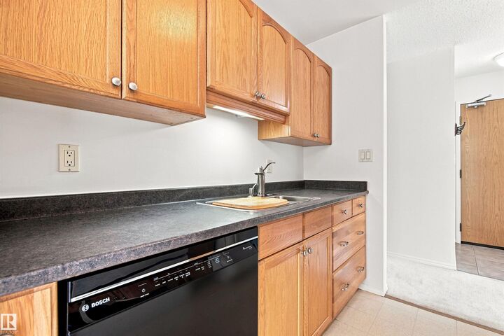 Property Photo:  10511 19 Av NW NW 115  AB T6J 5S8 