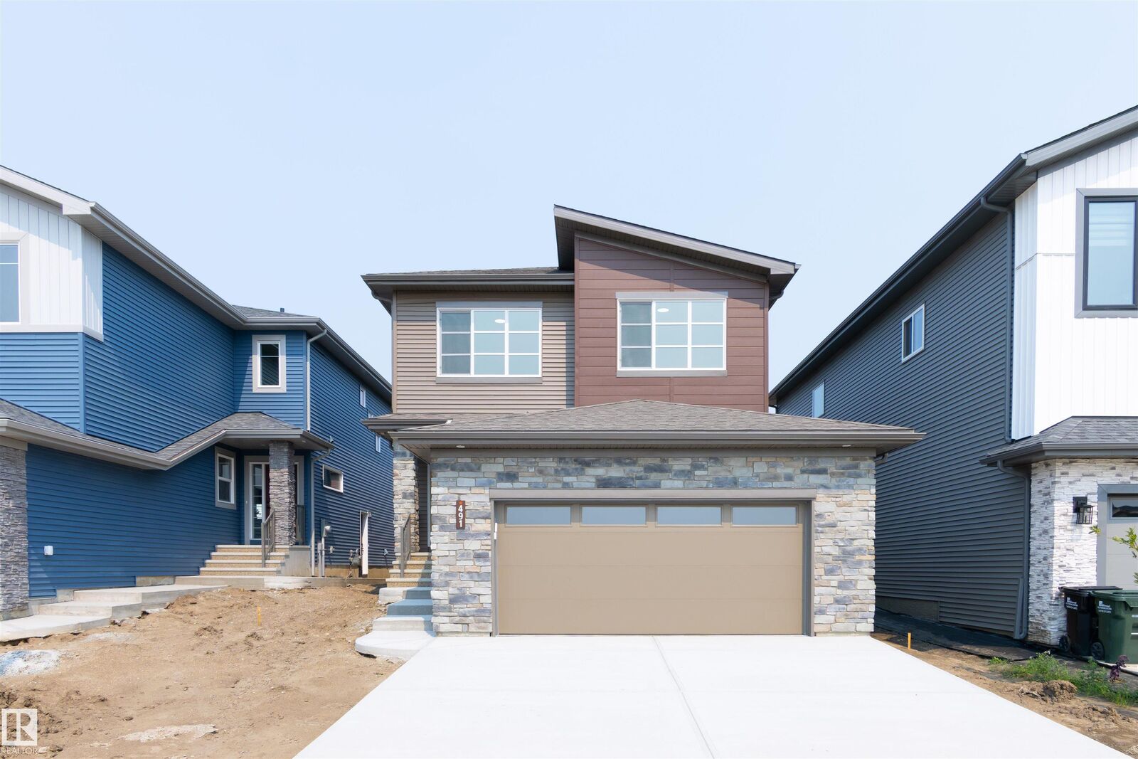 Property Photo:  491 Canter Wynd  AB T8H 3A9 