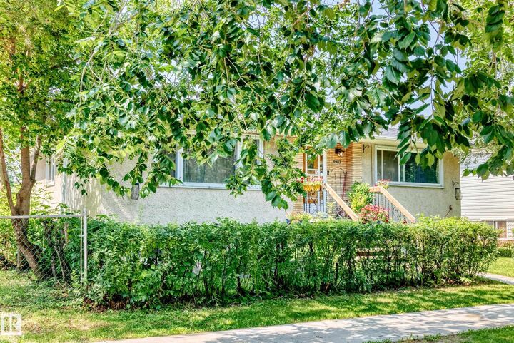 Property Photo:  12718 126 Street NW  AB T5L 0X8 
