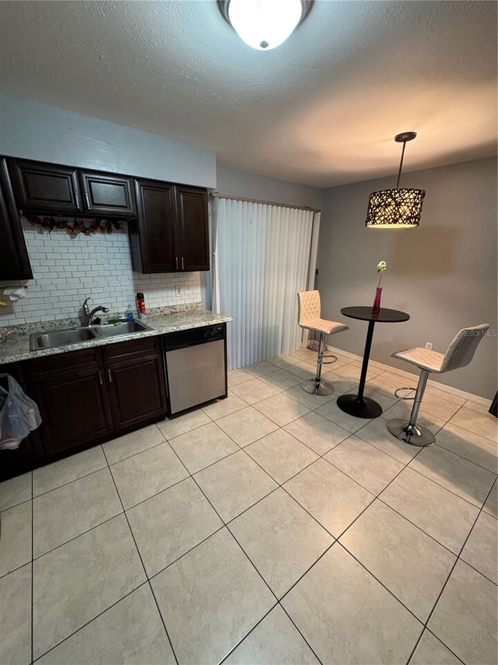 Property Photo:  1800 Warringwood Drive C6  FL 32839 