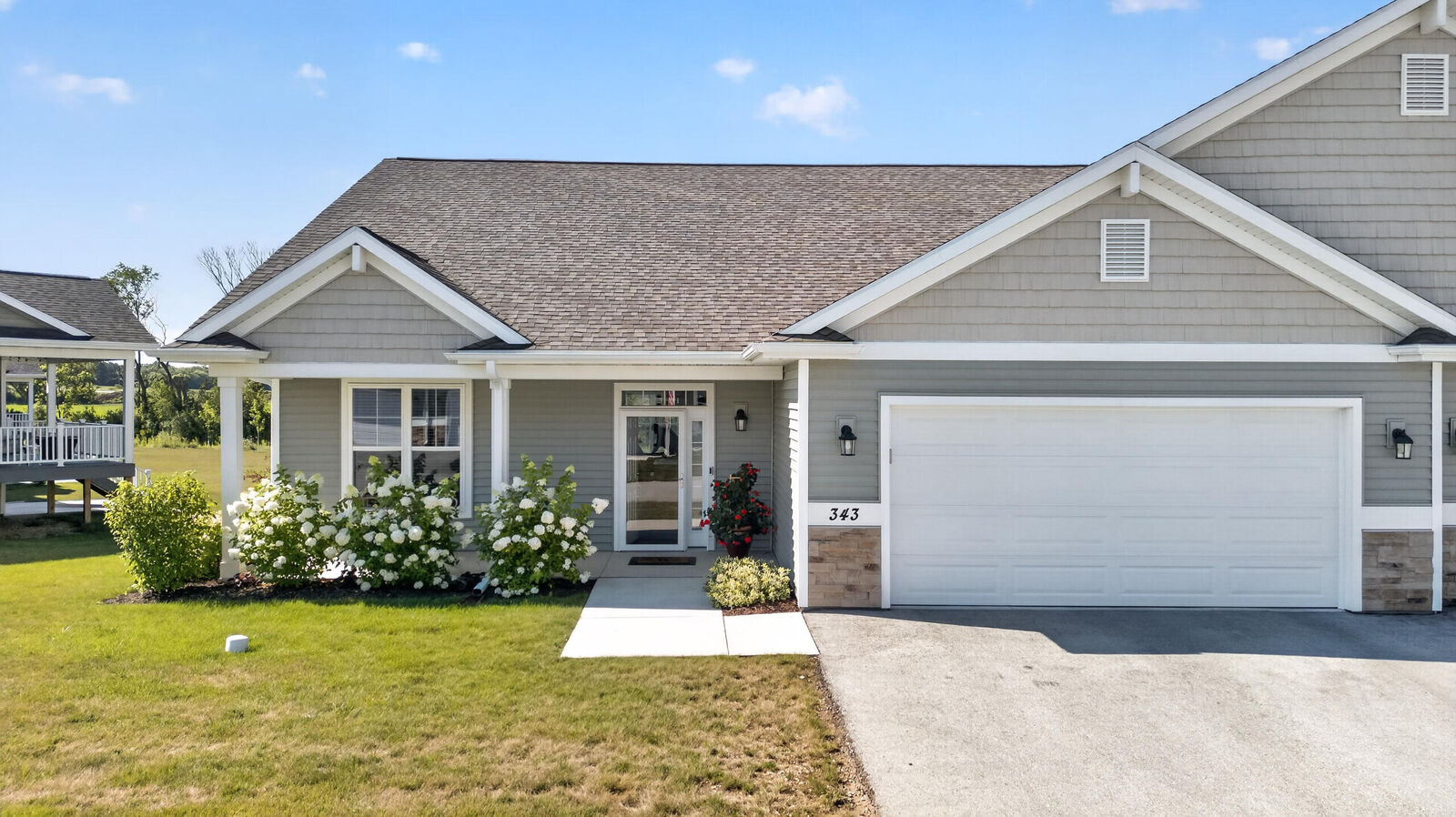 Property Photo:  343 Greystone Cir  WI 53073 
