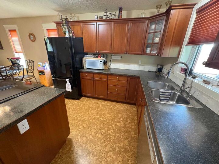 Property Photo:  10032 102 Street  AB T8S 1S5 