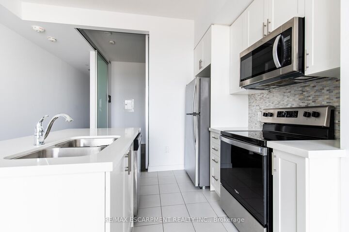Property Photo: 450 Dundas Street E 416 ON L8B 1Z2