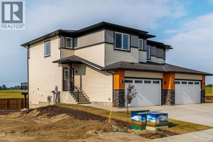 Property Photo: 142 Lakewood Crescent AB T1P 0G6