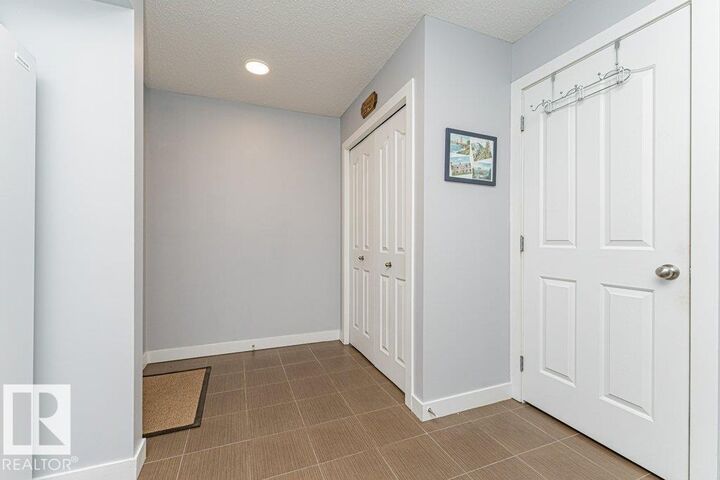 Property Photo: 270 McConachie Drive NW 402 AB T5Y 3N4