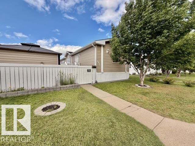 Property Photo: 4814 48 Avenue AB T9A 0E7