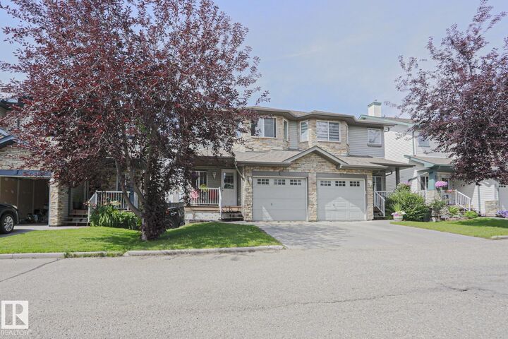 Property Photo: 6304 Sandin Way NW 49 AB T6R 0J8