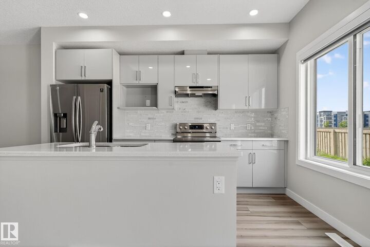 Property Photo: 4879 Alwood Point(E) SW AB T6W 4N1