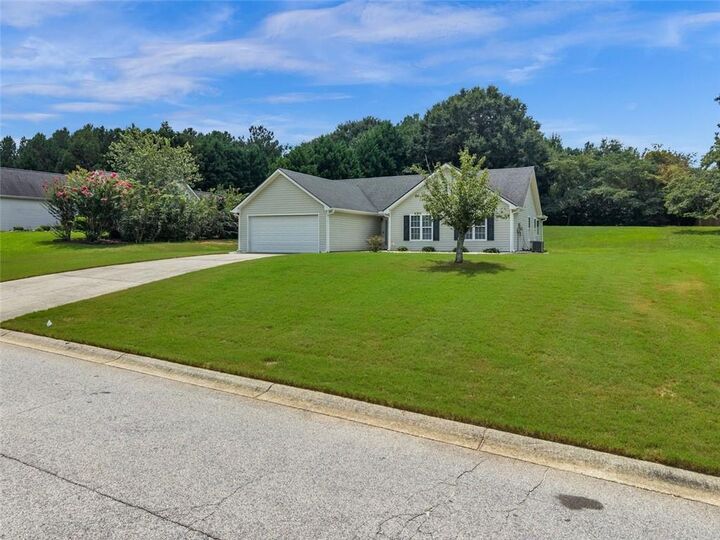 Property Photo: 7020 Greenridge Drive GA 30052