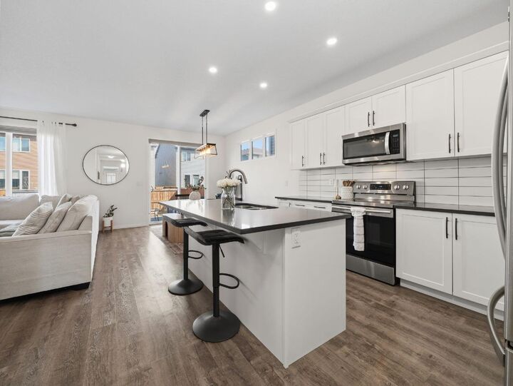 Property Photo: 414 Windrow Common SW AB T4B 4K4