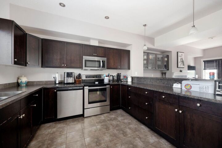 Property Photo:  313 Millennium Drive 21  AB T9K 0M2 