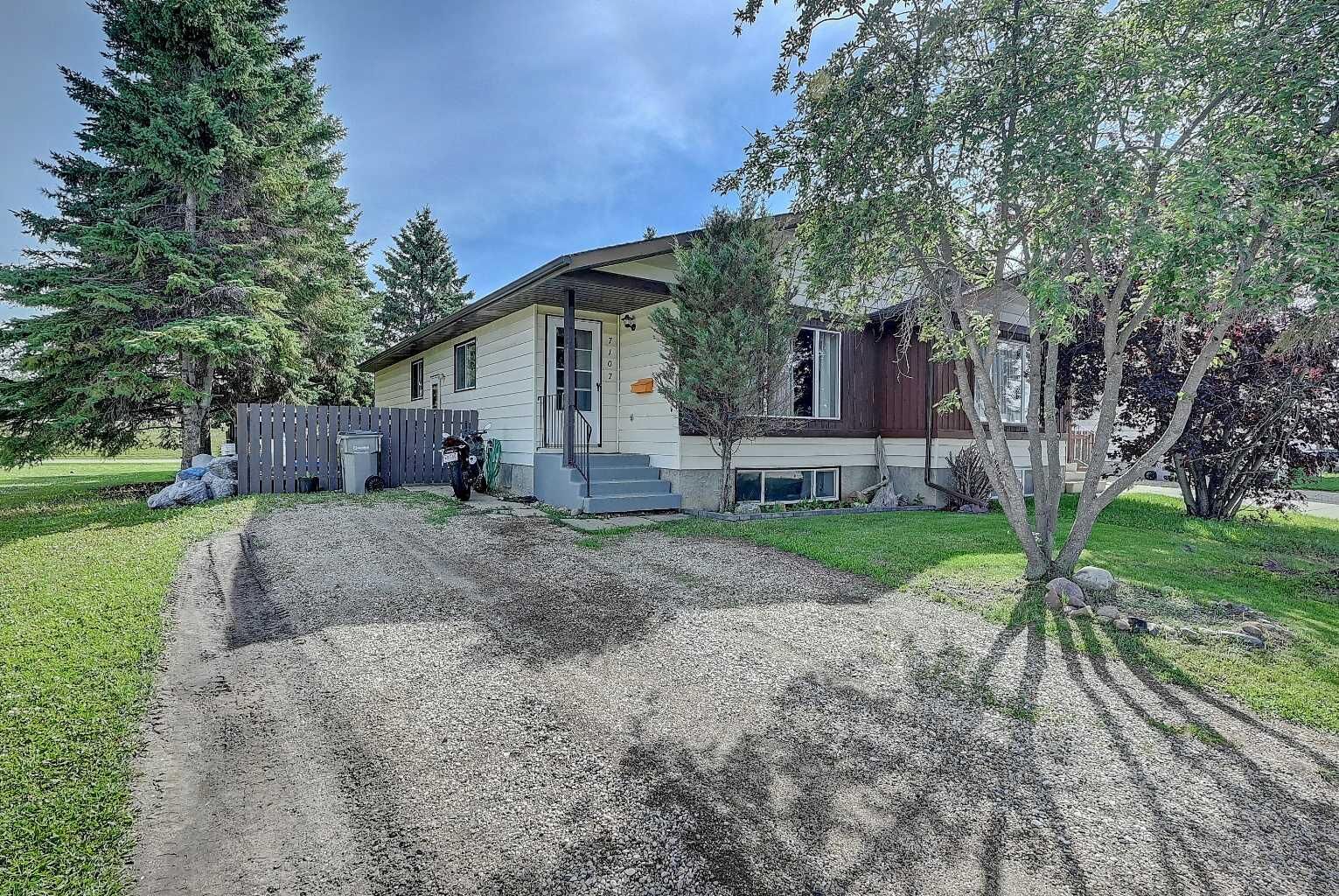 Property Photo: 7107 93 Street AB T8V 6H4