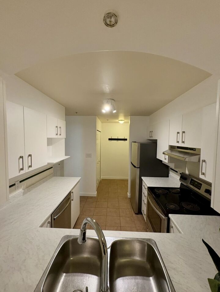 Property Photo: 3600 Windcrest Drive 212 BC V7G 2S5