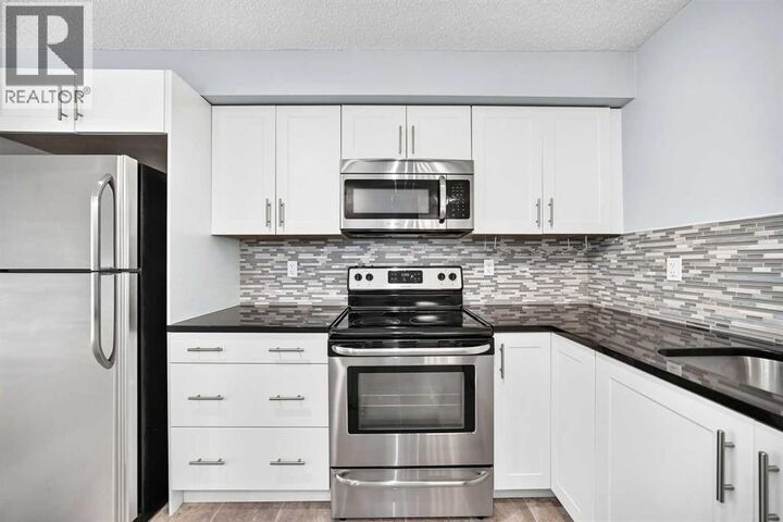 Property Photo:  755 Copperpond Boulevard Southeast  AB T2Z 4R2 