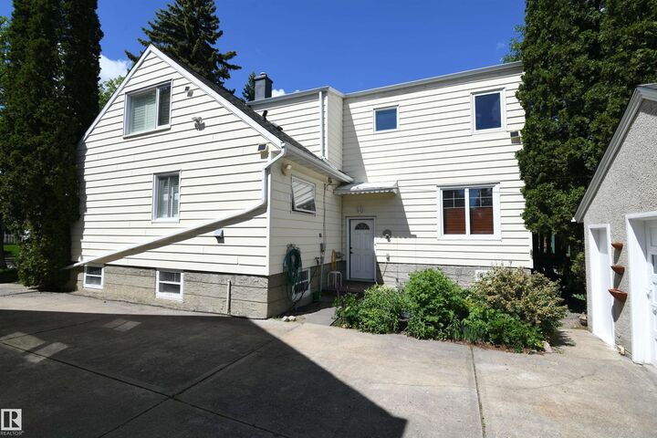 Property Photo:  10837 139 Street NW  AB T5M 1P6 