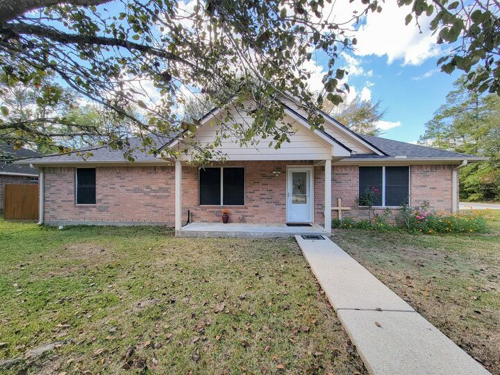 Property Photo:  1000 Shell Avenue  TX 77327 