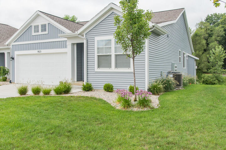 Property Photo:  1423 N Village Circle  MI 49009 
