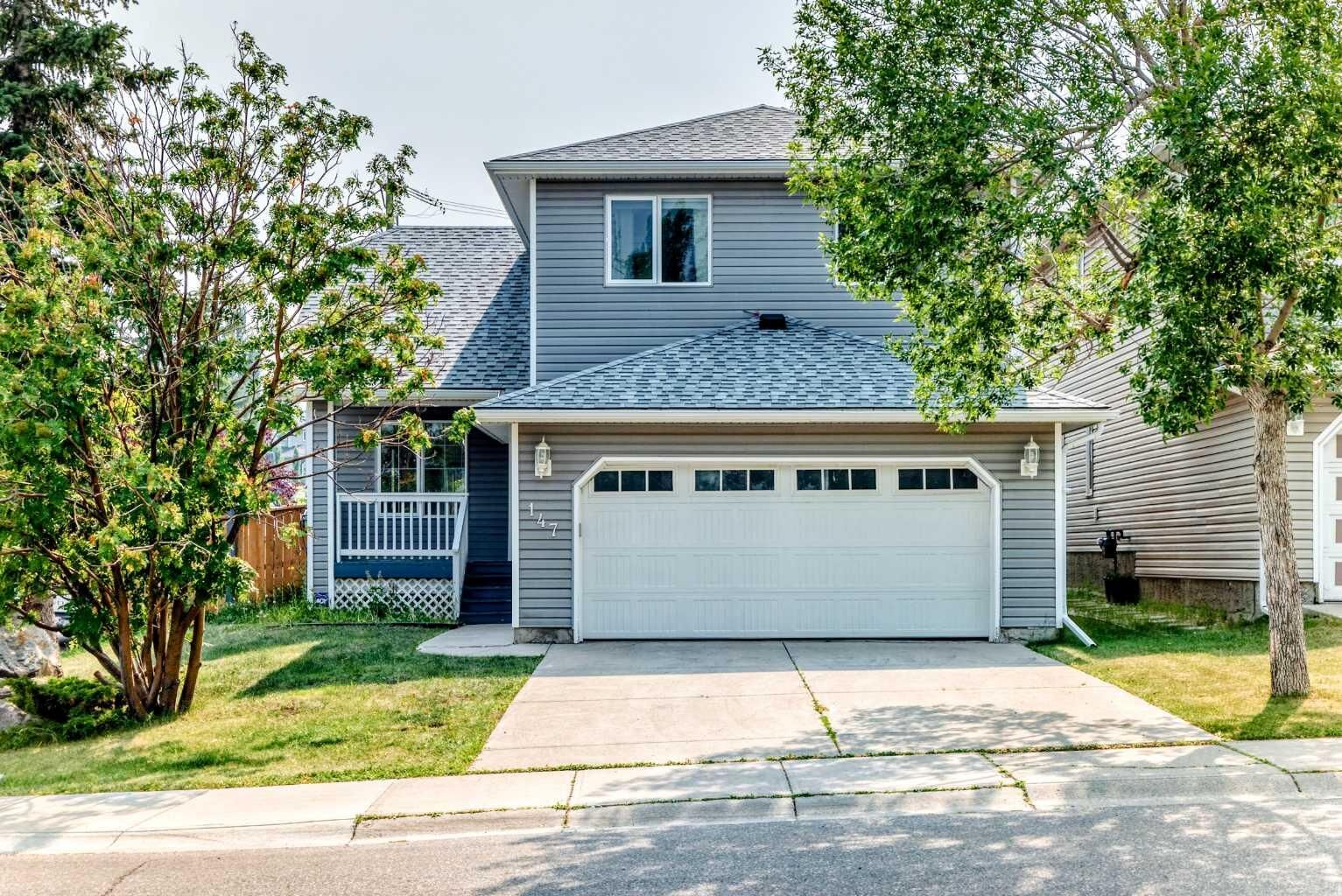 Property Photo: 147 Macewan Drive NW AB T3K 3G5