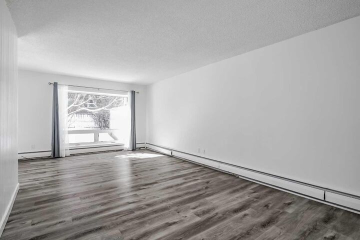 Property Photo: 6919 Elbow Drive SW 113 AB T2V 0E6