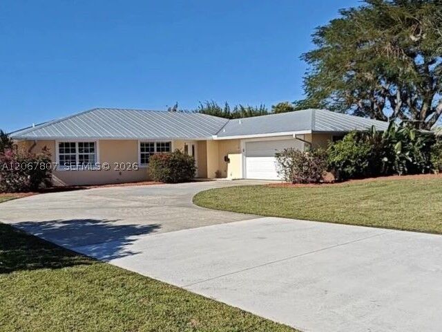 Property Photo:  2472 NW Everglades Blvd  FL 34994 