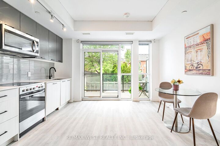 Property Photo: 2300 St Clair Avenue W 211 ON M6N 0B3