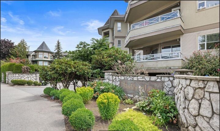 Property Photo: 20120 56 Avenue 310 BC V3A 3Y4