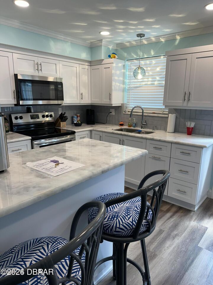 Property Photo:  3433 S Peninsula Drive 100  FL 32118 
