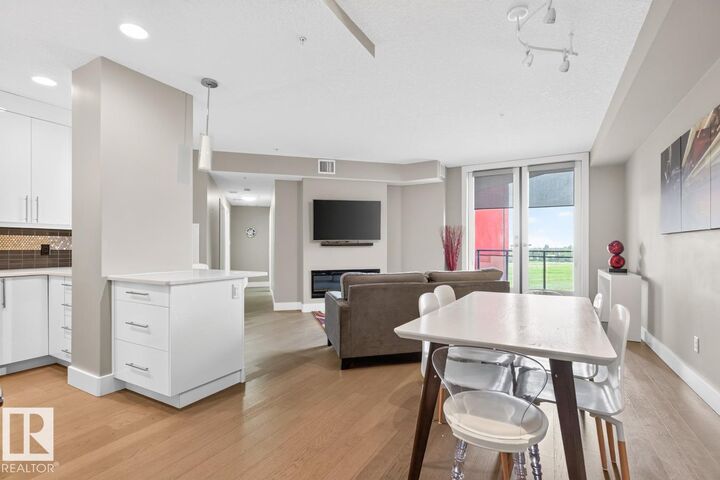 Property Photo: 11080 Ellerslie Road SW 510 AB T6W 2C2