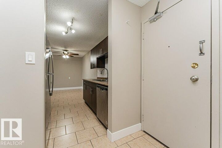 Property Photo: 14004 26 Street NW 209 AB T5Y 1Y4