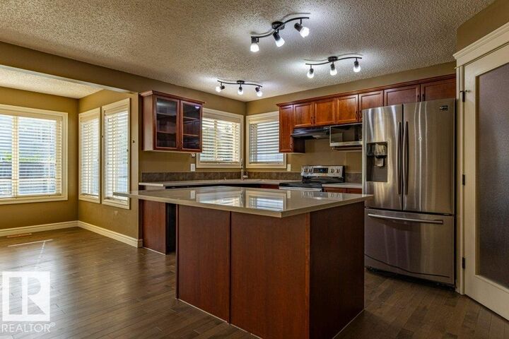 Property Photo: 1115 117A Street SW AB T6W 0B9