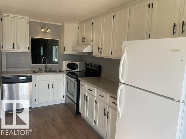 Property Photo: 450 Evergreen Park NW AB T5Y 4M2