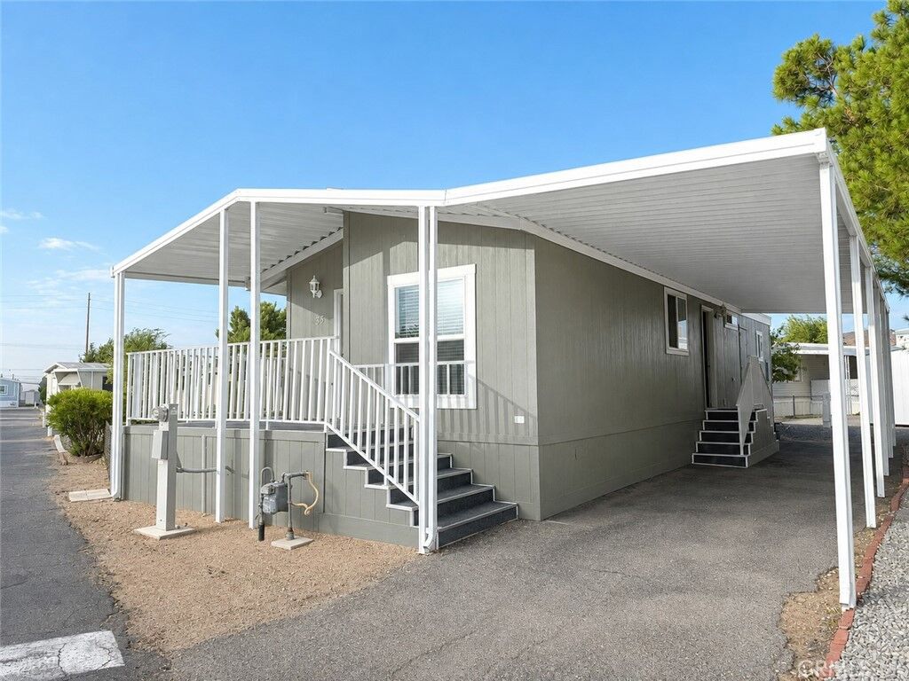 Property Photo:  22601 Bear Valley Road 33  CA 92308 