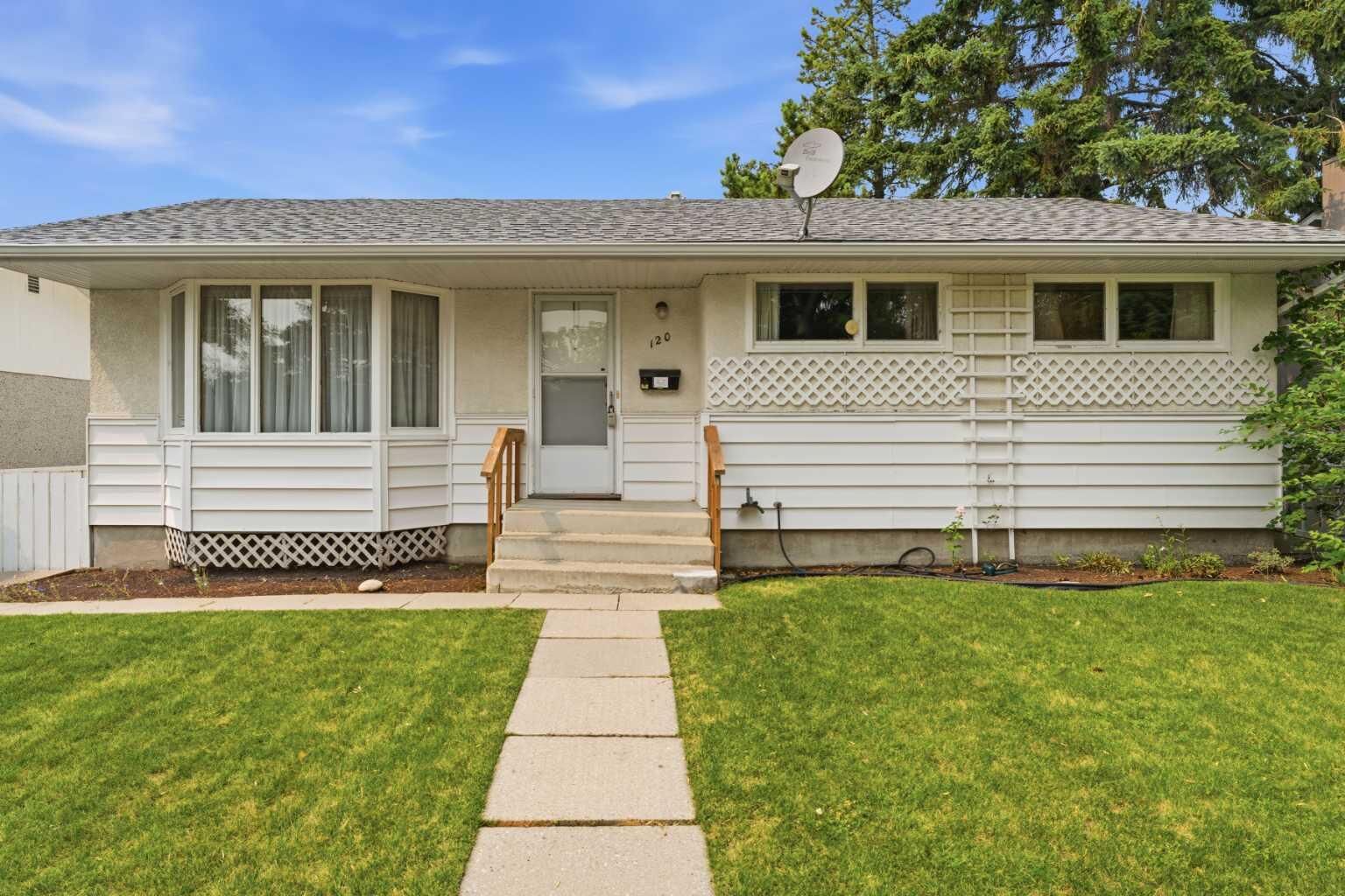 Property Photo: 120 Glenpatrick Drive SW AB T3E 4L6