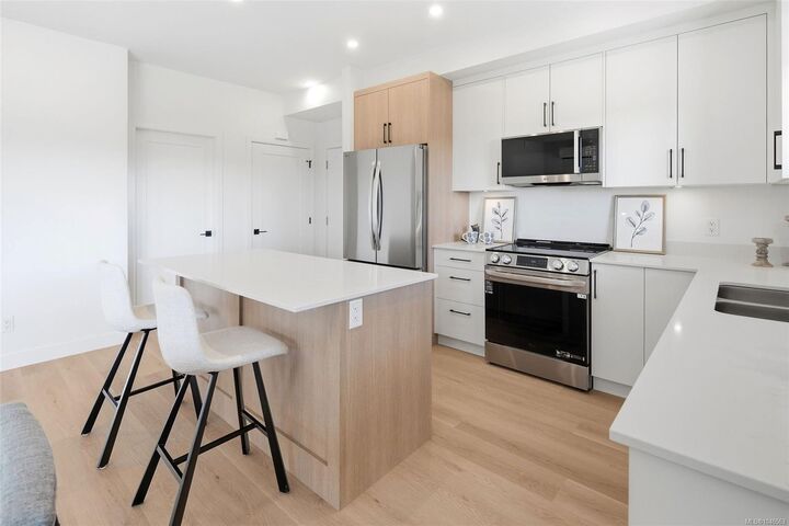 Property Photo: 7053 Central Saanich Rd #201 BC V8M 1Y3