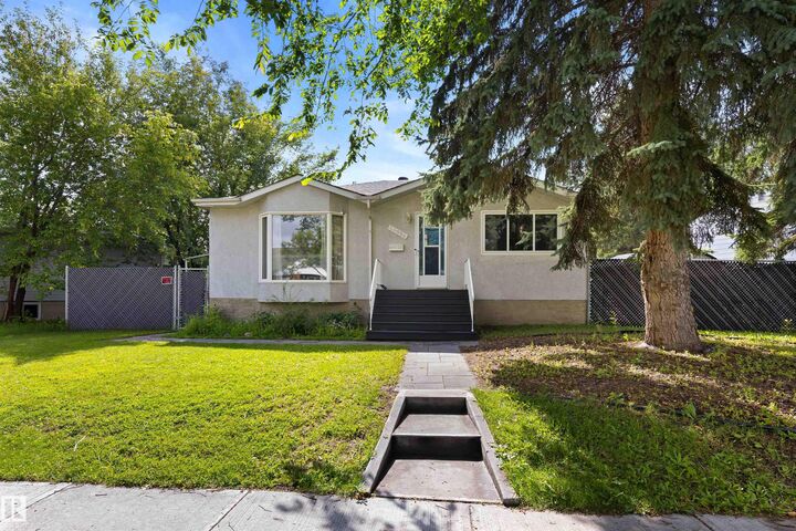 Property Photo: 10994 135 Street NW AB T5M 1K2