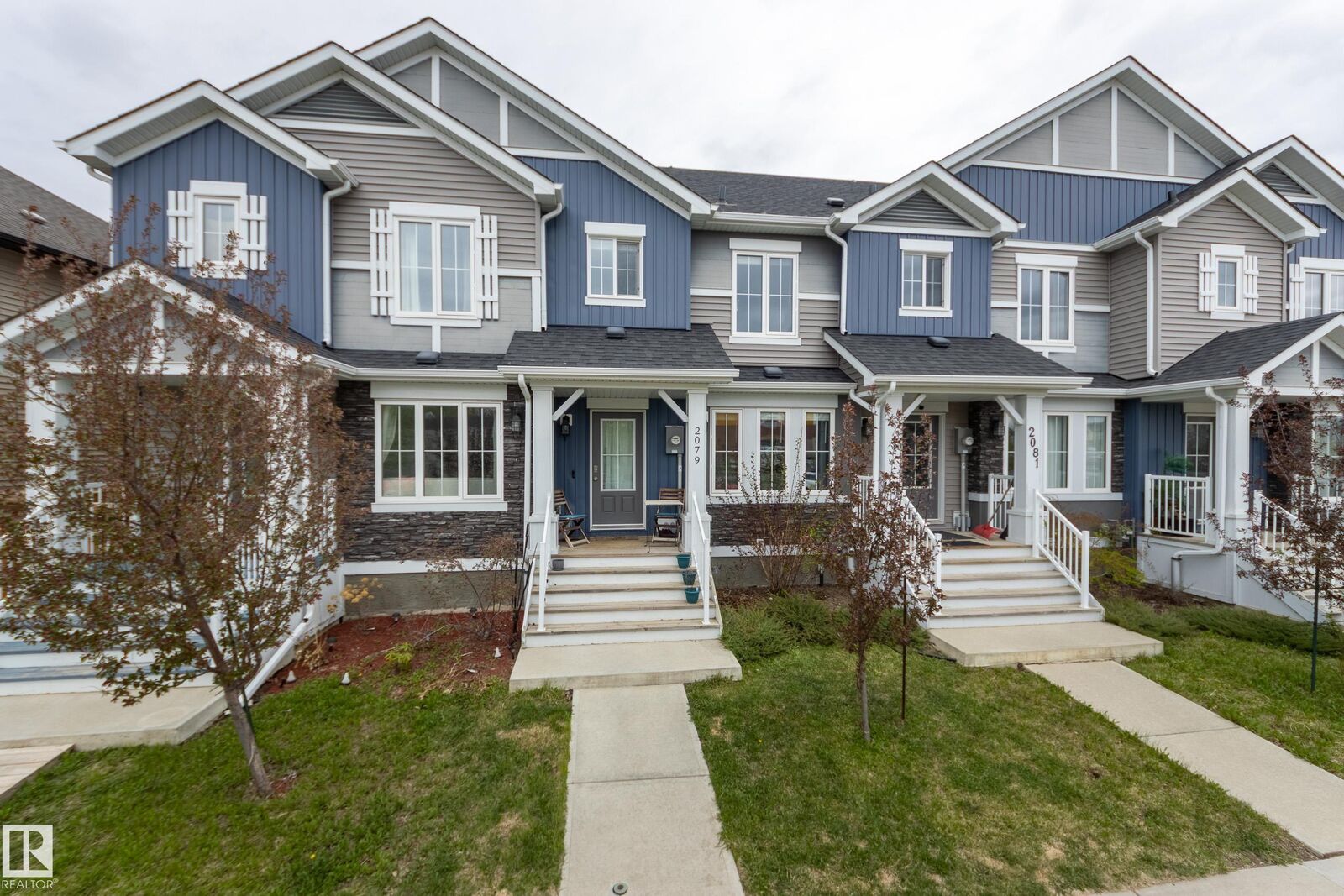 Property Photo: 2079 Desrochers Drive SW AB T6W 4B9