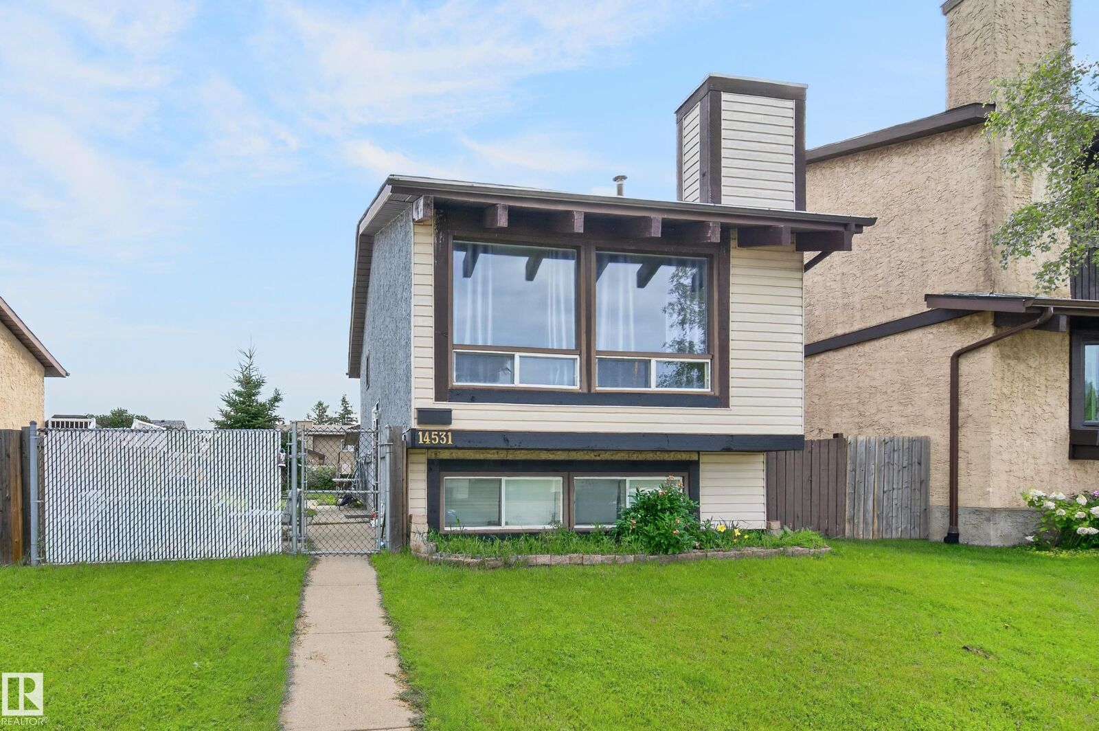 Property Photo: 14531 31A Street NW AB T5Y 2A9