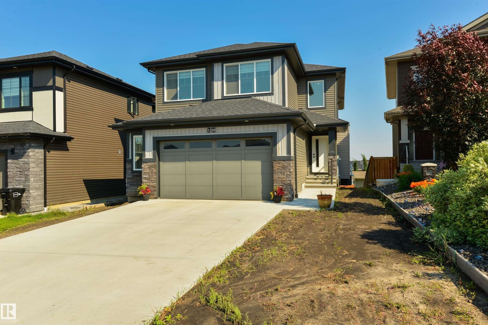 Property Photo: 1208 Peregrine Terrace NW AB T5S 0M3